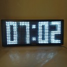Karlsson Wall clock LED white light black case plastic 58.5 x 25 x 8.7cm Incl. transformer