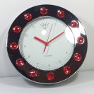 Wanted  Wall clock w. red diamands