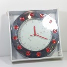 Wanted  Wall clock w. red diamands
